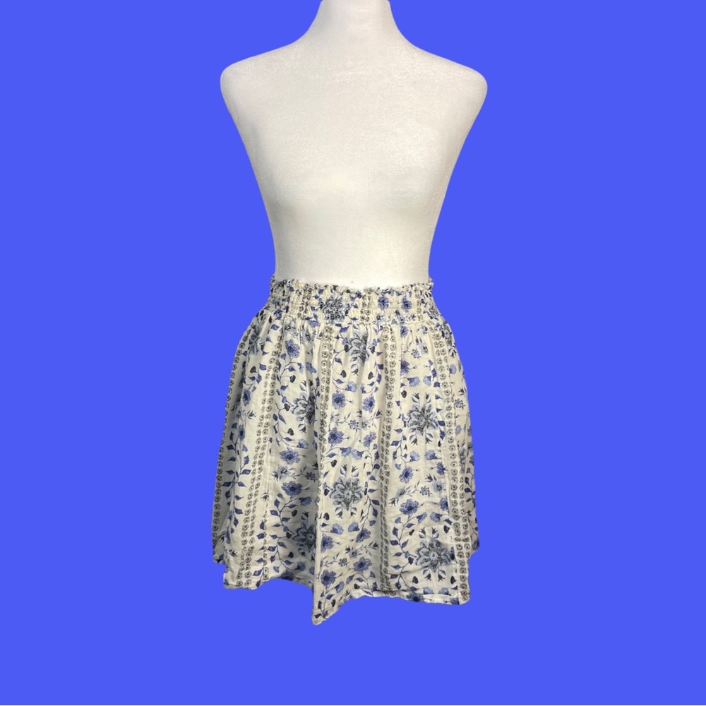 Classy white and blue mini skirt with blue floral print